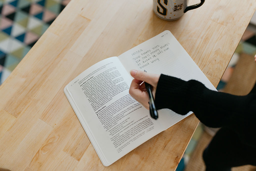 Woman journaling in her Bible