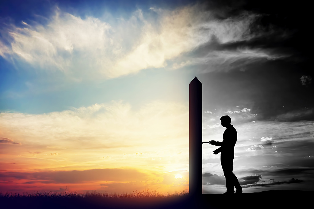 Man unlocking a silo starting life anew