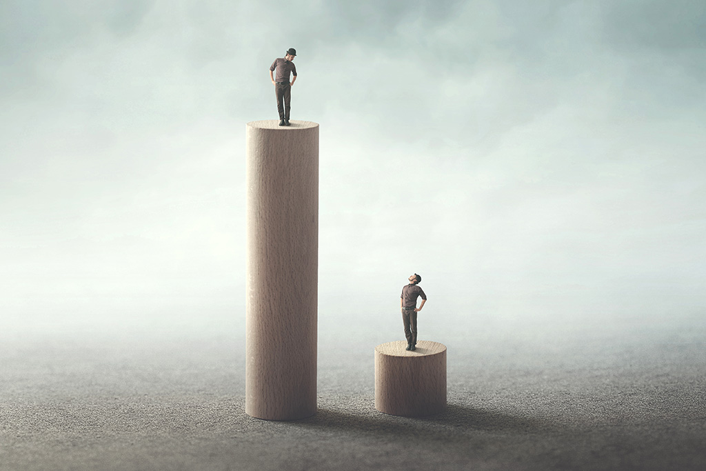 Man on a high platform and another on a low one