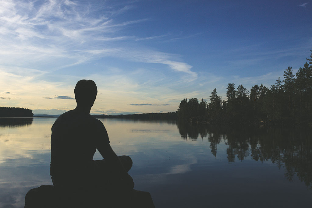 man considering the divine power of God