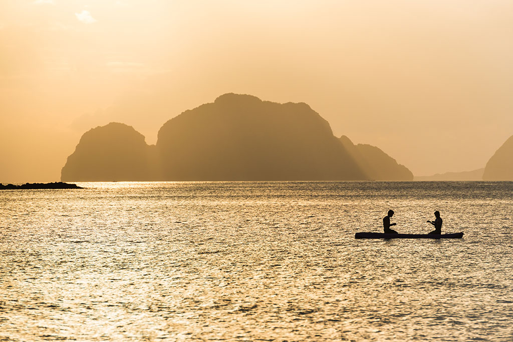 2 people on a boat