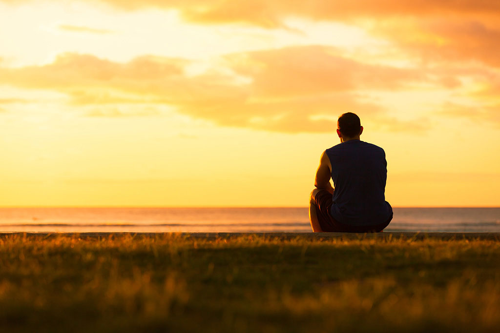 Man sitting alone in grief