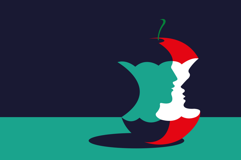 Apple with faces of Adam and Eve