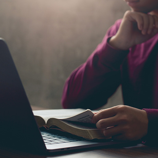 Man reading NIV Bible